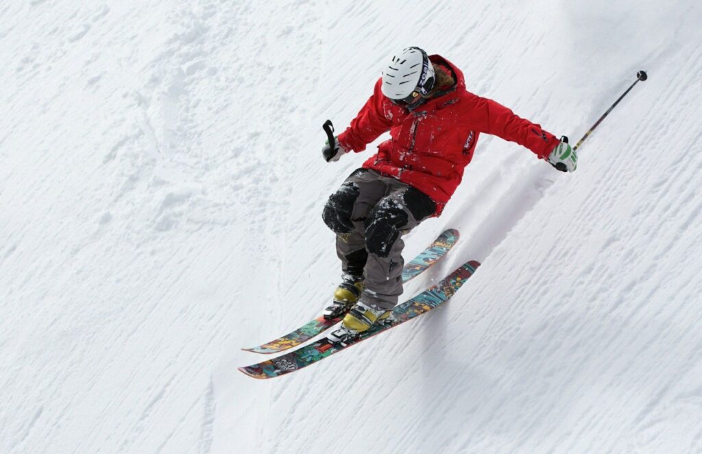 A man jumping with skiing in winter