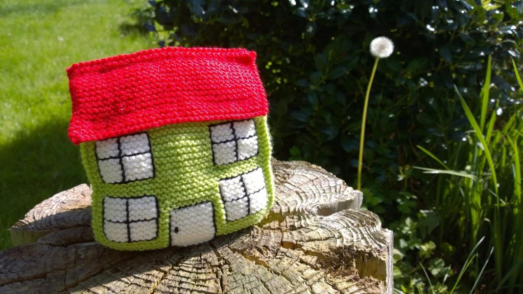 knitted house in the garden