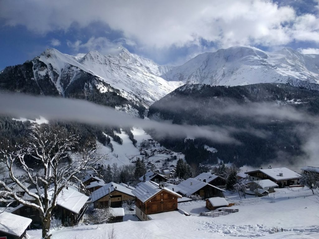 mountain houses in the mist