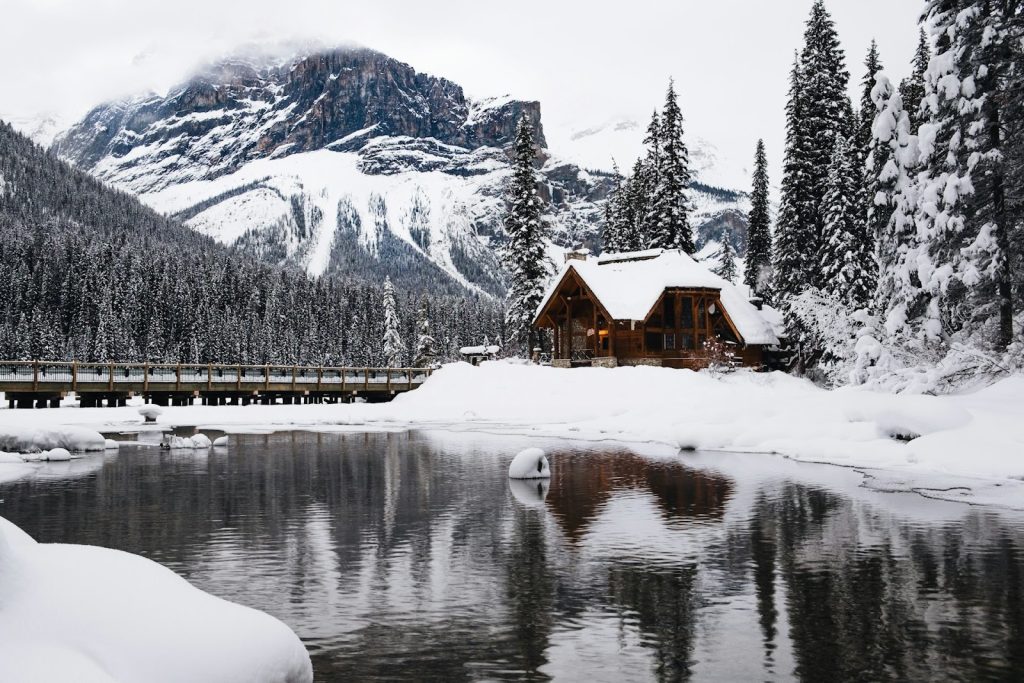 a chalet in the snowy mountains