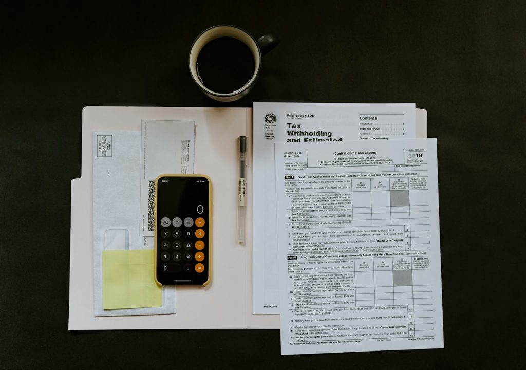 a tax form and a smartphone