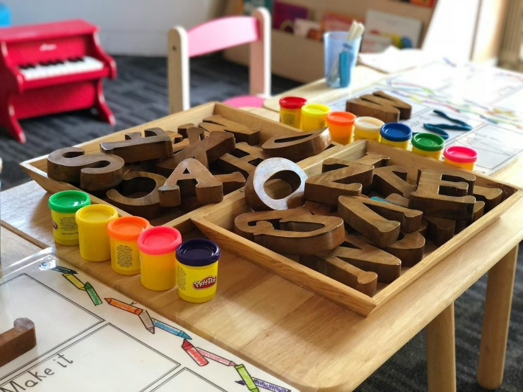 wooden toys on a children's desk