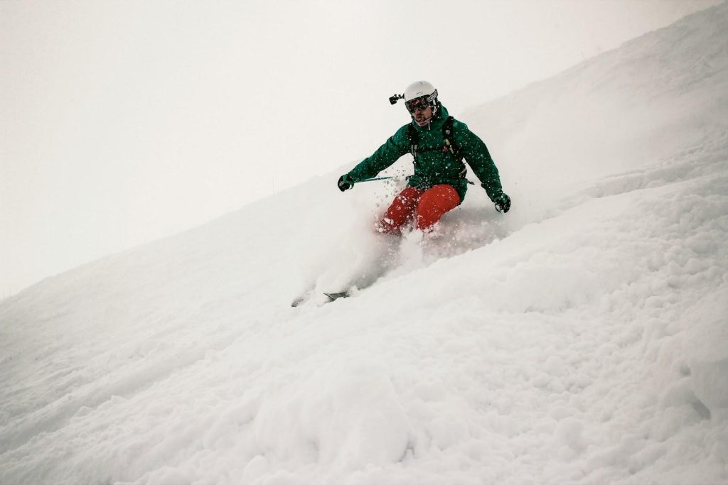 a man freeride skiing