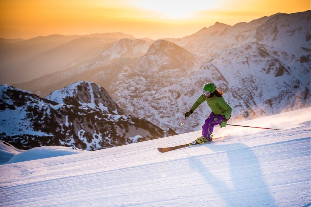 a skier descending a slope