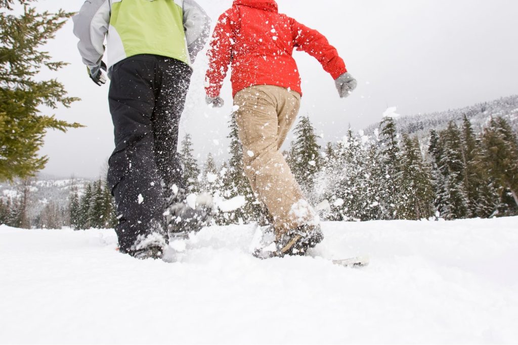 two people snowshoeing